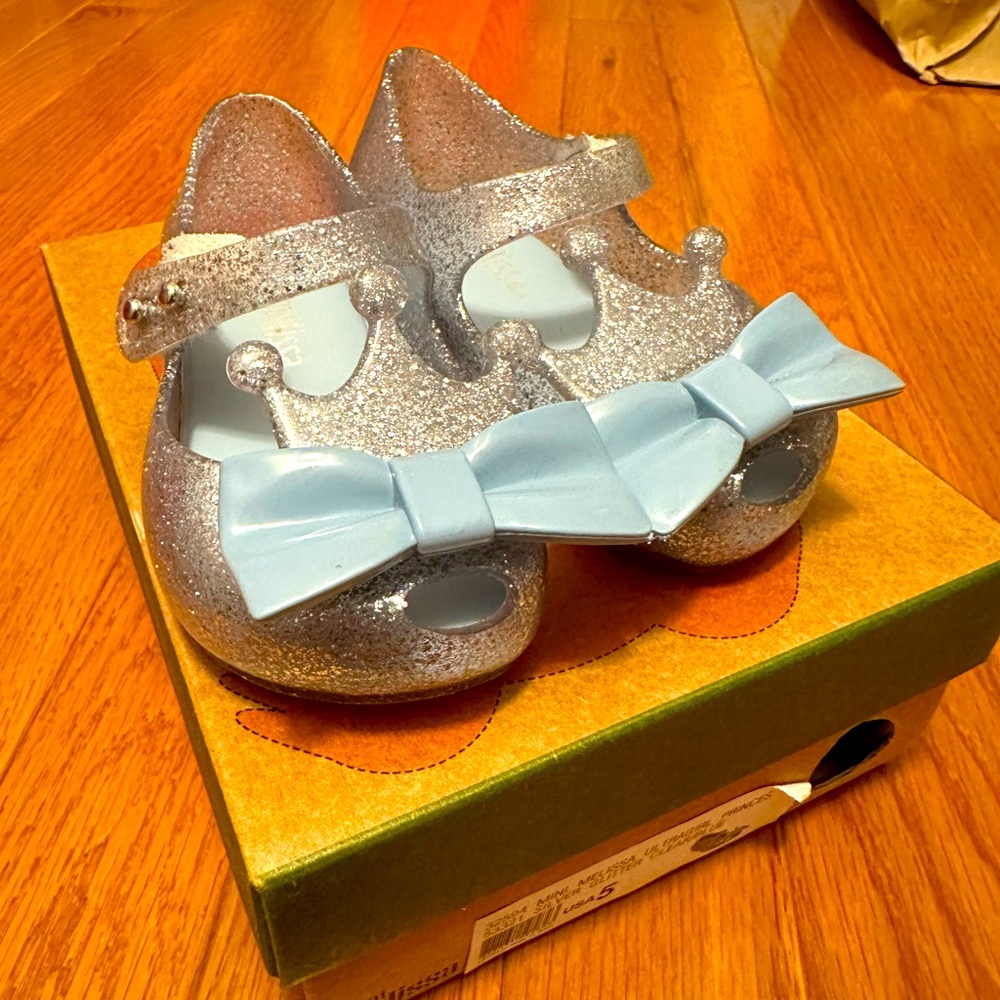 Mini Melissa Silver Glitter Shoes with Blue Bow